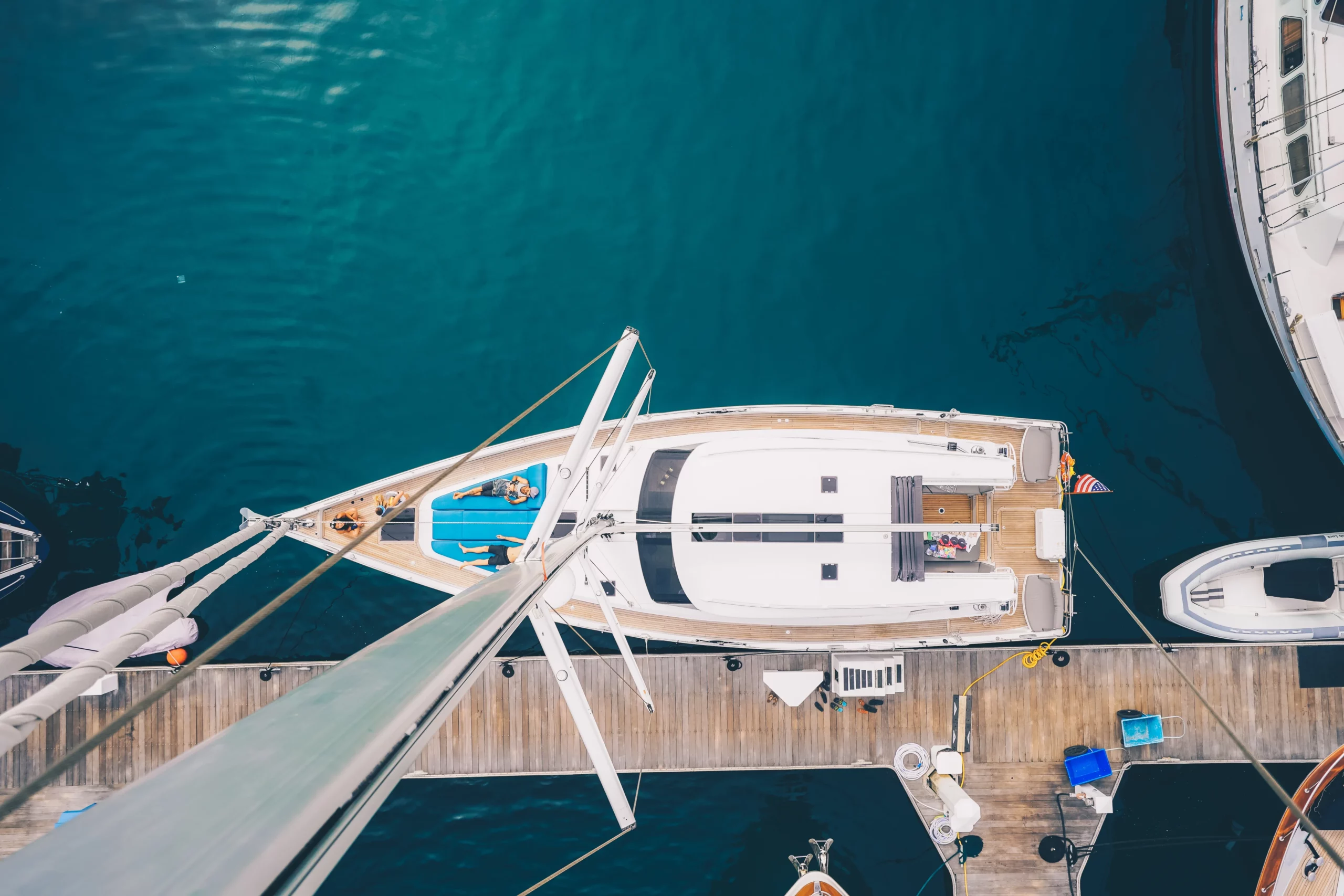 overhead-shot-of-a-sailboat-docked-in-san-diego-ba-2023-11-27-05-02-38-utc